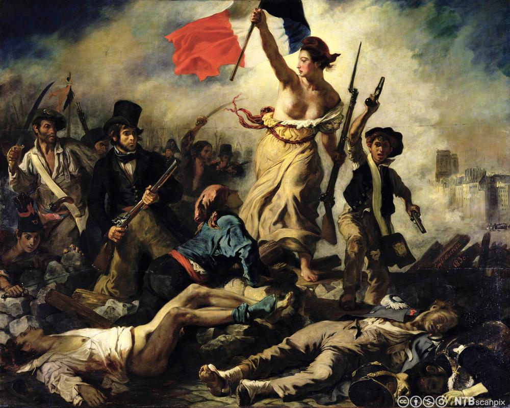 Friheten, i form av en kvinne med blottede bryster og flagget Trikoloren høyt hevet, leder folket på barrikadene. Kunstverket har motiv fra den franske revolusjonen av 1830. Maleri. 