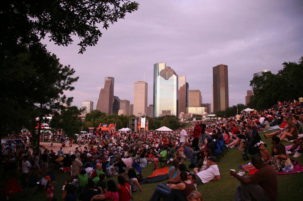 People gathered outside on 4th of July in Houston, Texas. Photo.