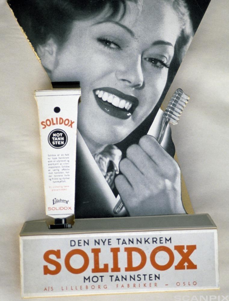 Eldre reklame for Solidox tannkrem. Illustrasjon.