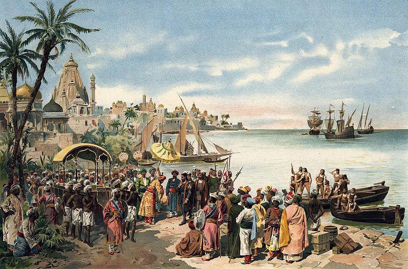 Vasco da Gama ankommer Calicut i 1498. Han og følget hans blir tatt imot av en stor delegasjon på stranda i forgrunnen. På stranda er det mange menn i turban. Menn i lendeklede løfter en bærestol på skuldrene. Ved stranda er det to robåter med sjøfolk. I bakgrunnen er det palmer, flere bygninger med kuppel og ei bukt. Tre seilskuter er ankret opp ute i bukta. Maleri.