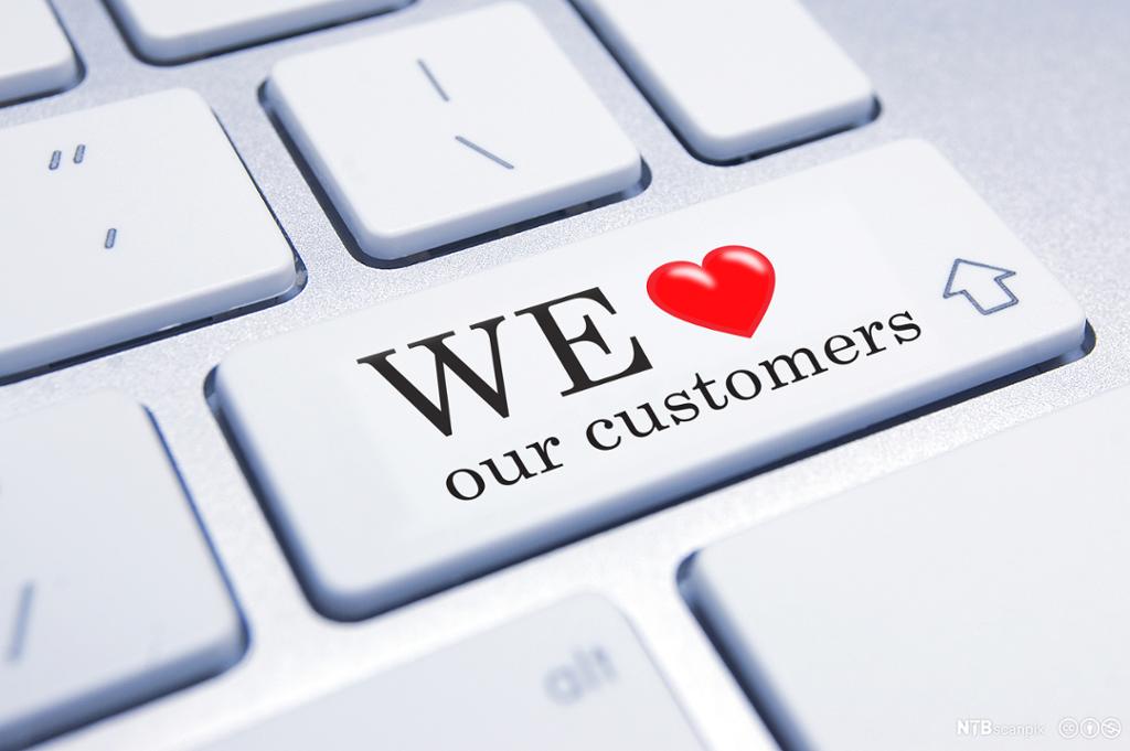 Tastaturknapp med teksten: We love our customers