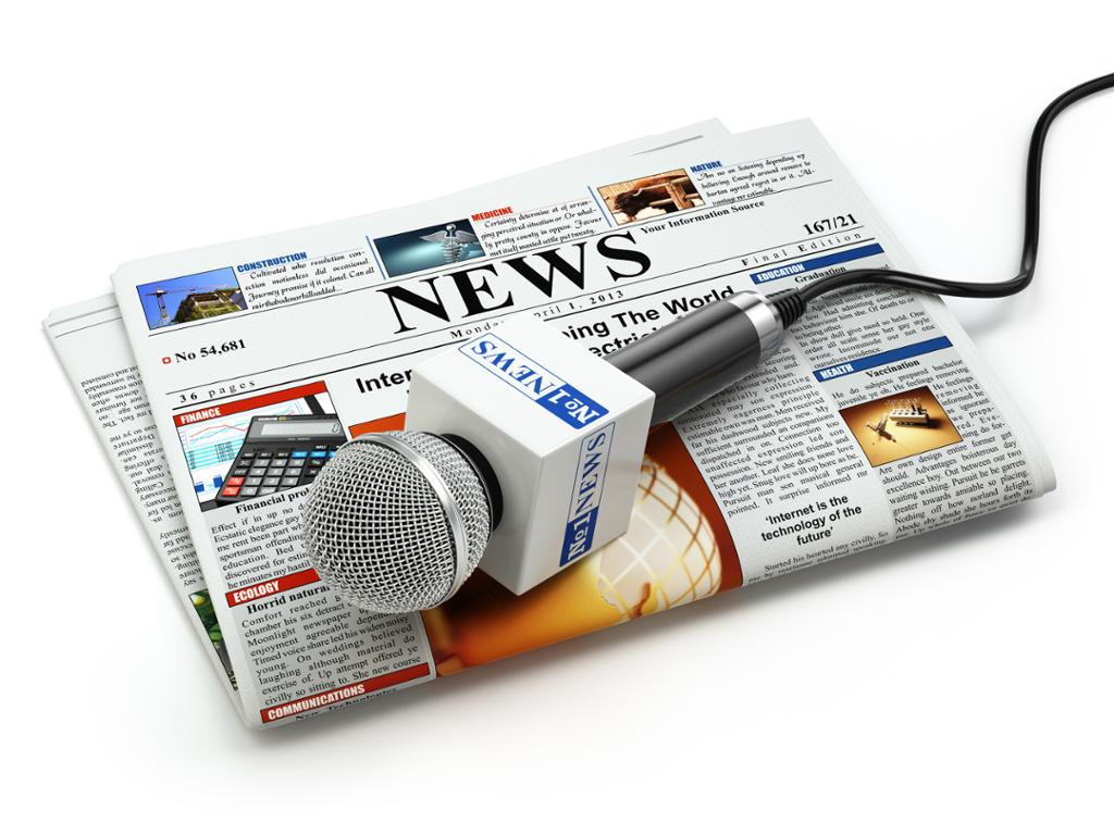 Microphone on newspaper