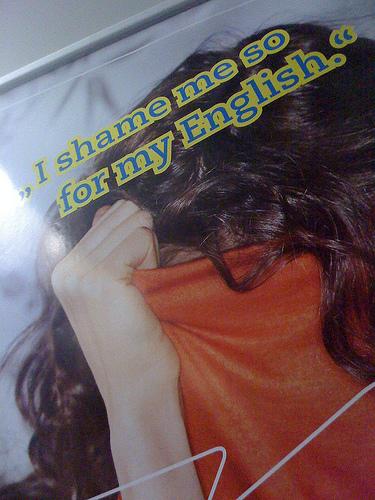 English Course Ad with text: "I shame me so for my English." Photo.