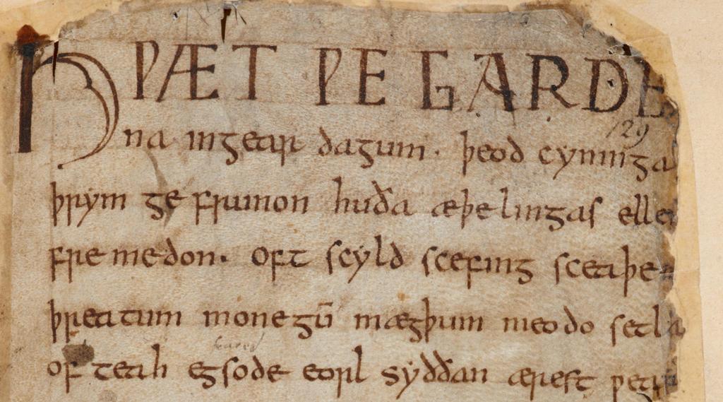 A page of parchment with writing on it. The letters and language is not like modern-day English. Photo.