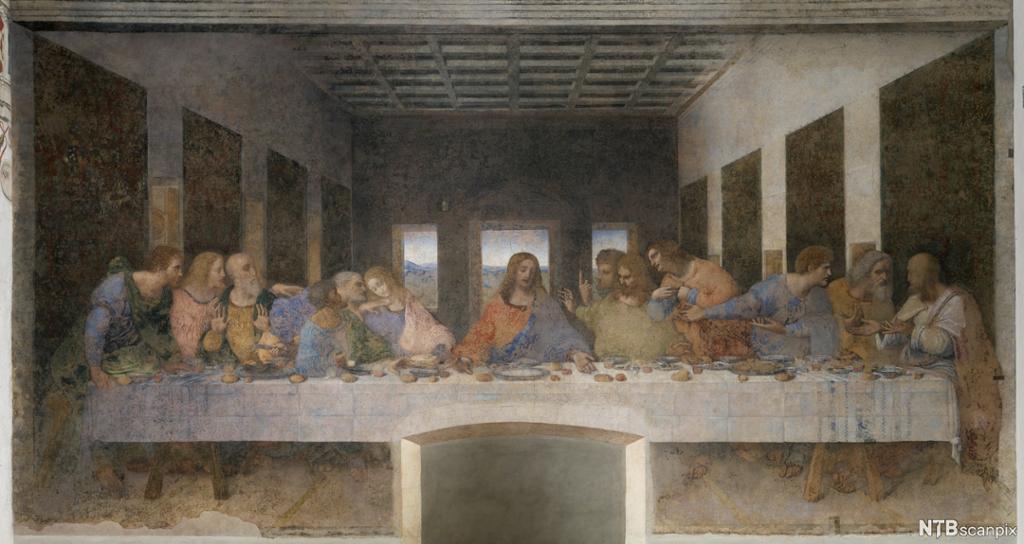 13 personer sitter ved siden av hverandre rundt et bord med matretter. Maleri.