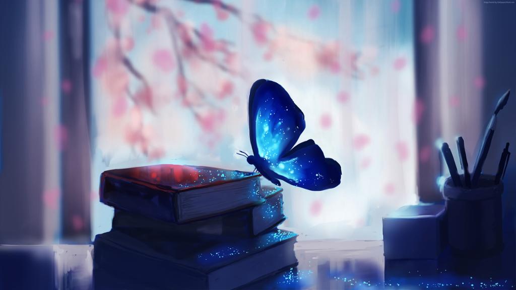 Blue butterfly sits on a pile of books. 