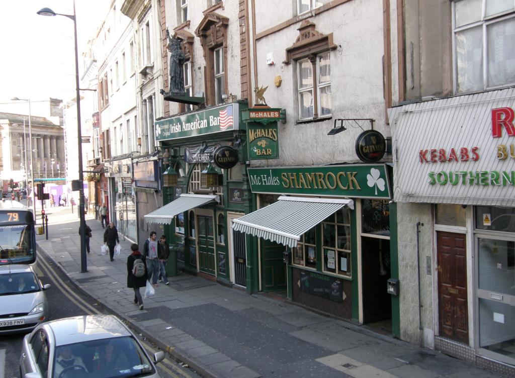 Street with irish pub in britain. Photo.