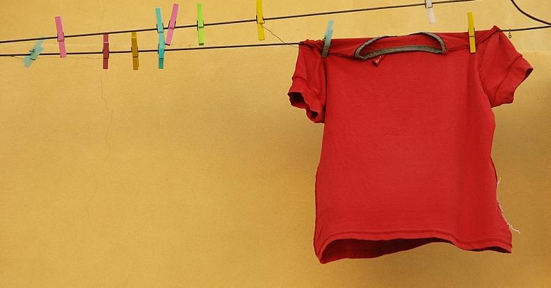 a red t-shirt on a washing line