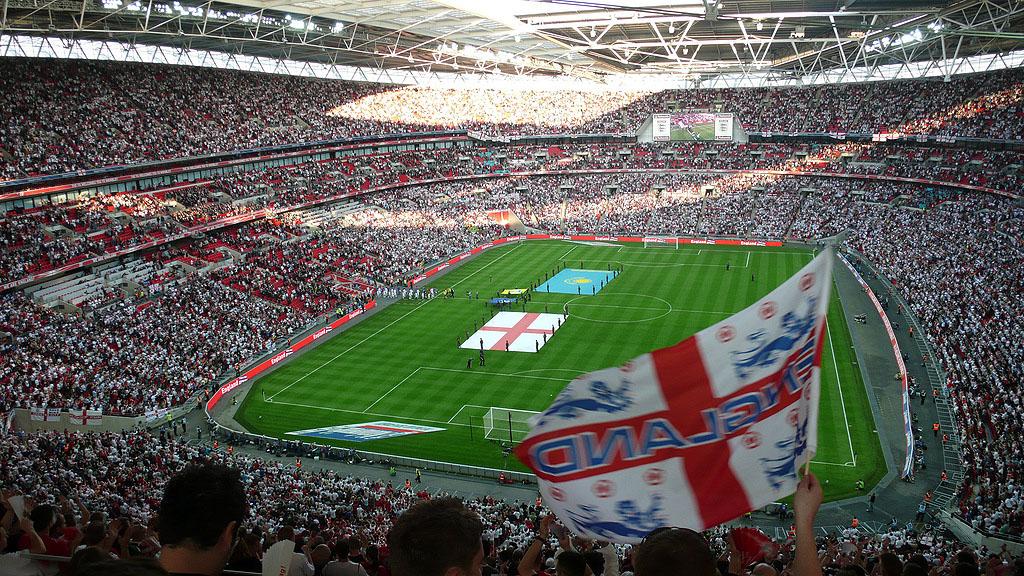 A full Wembley Stadium in London before the beginning of a match. Photo.