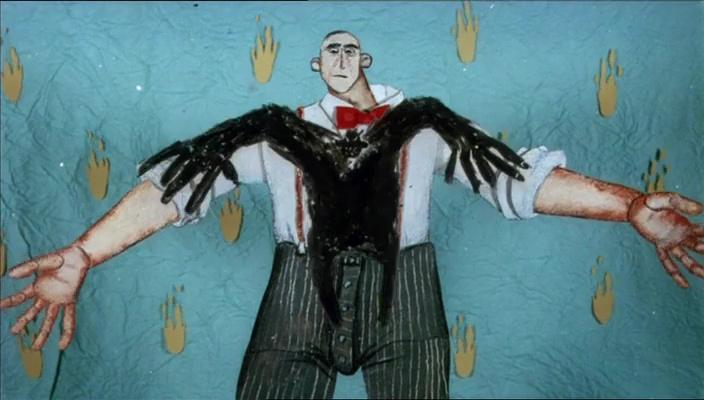 En mann med dressbukse, hvit skjorte, rød sløyfe og bukseseler strekker armene ut til siden. En svart skyggemann vokser ut av brystet på han. Stillbilde fra animasjonsfilmen «Sinna Mann».