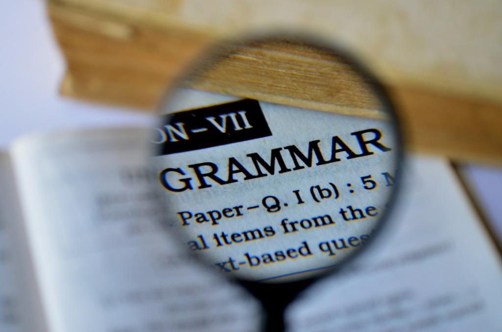 The word "grammar" in a book seen through a looking glass. Phot.