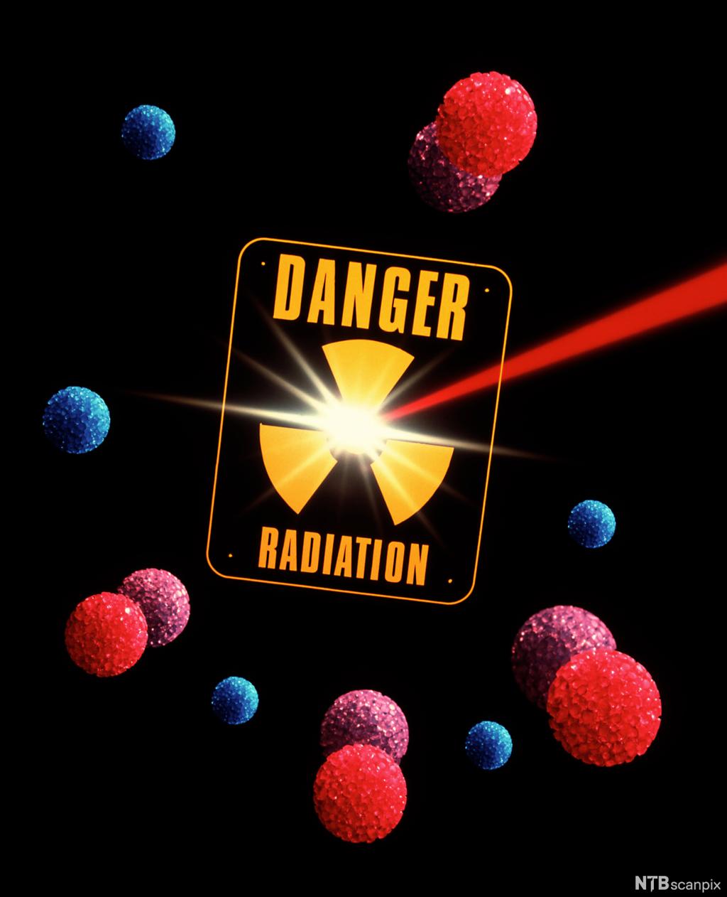 Advarsels-symbol mot radioaktivitet sammen med celler. Illustrasjon.