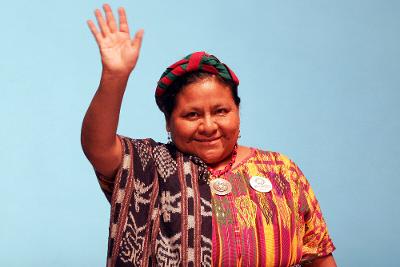 Nobel Peace Prize laureate and Guatemala's Presidential candidate Rigoberta Menchu waves during a candidates debate in Guatemala City, Wednesday, Aug. 8, 2007. Presidential election is scheduled to take place on Sept. 9. (AP Photo/Moises Castillo)