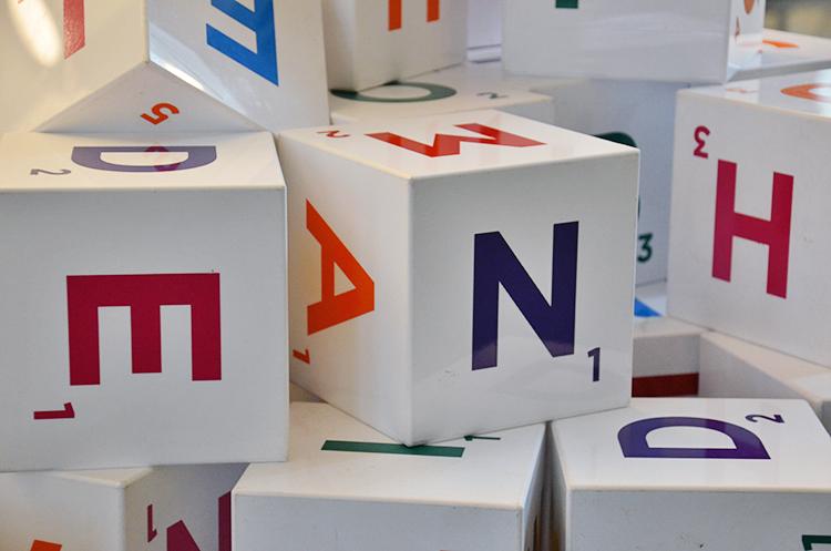 Wooden blocks with printed letters. Photo.