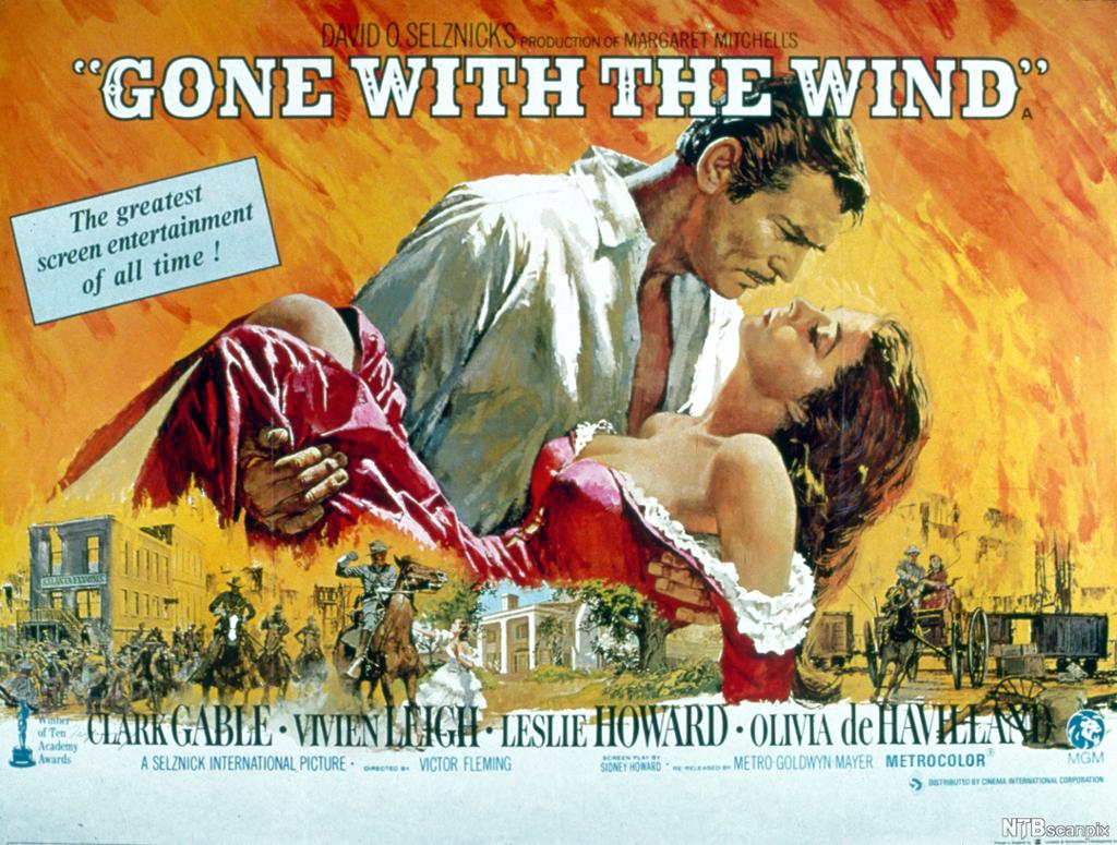 Film poster, man carries woman, the sky is orange. 