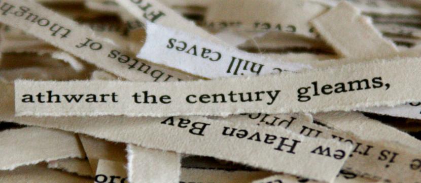 Photo: A heap of paper strips with sentences and words that can be made into a poem.