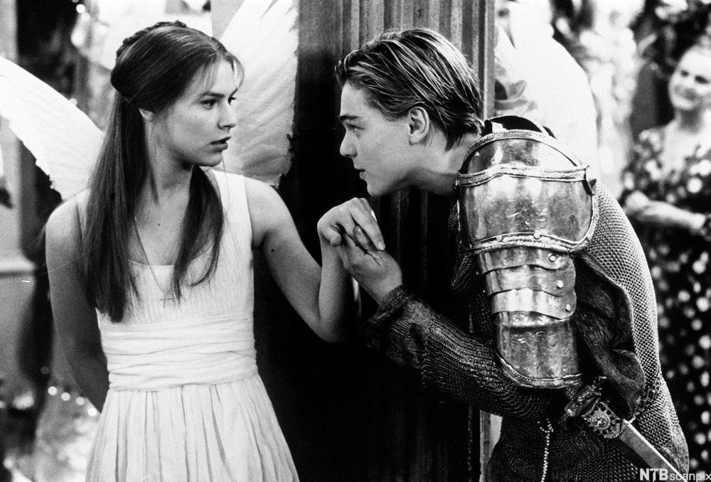 Scene from the movie "Romeo and Juliet" where Romeo meets Julie for the first time at a party arranged by the Capulet family. Photo.