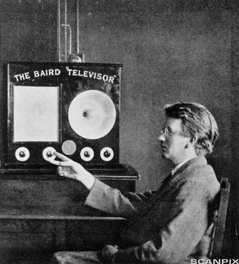 TheBaird 'Televisor'. View of the Scottish electrical engineer John Logie Baird and his invention, the 'Televisor'. The televiso