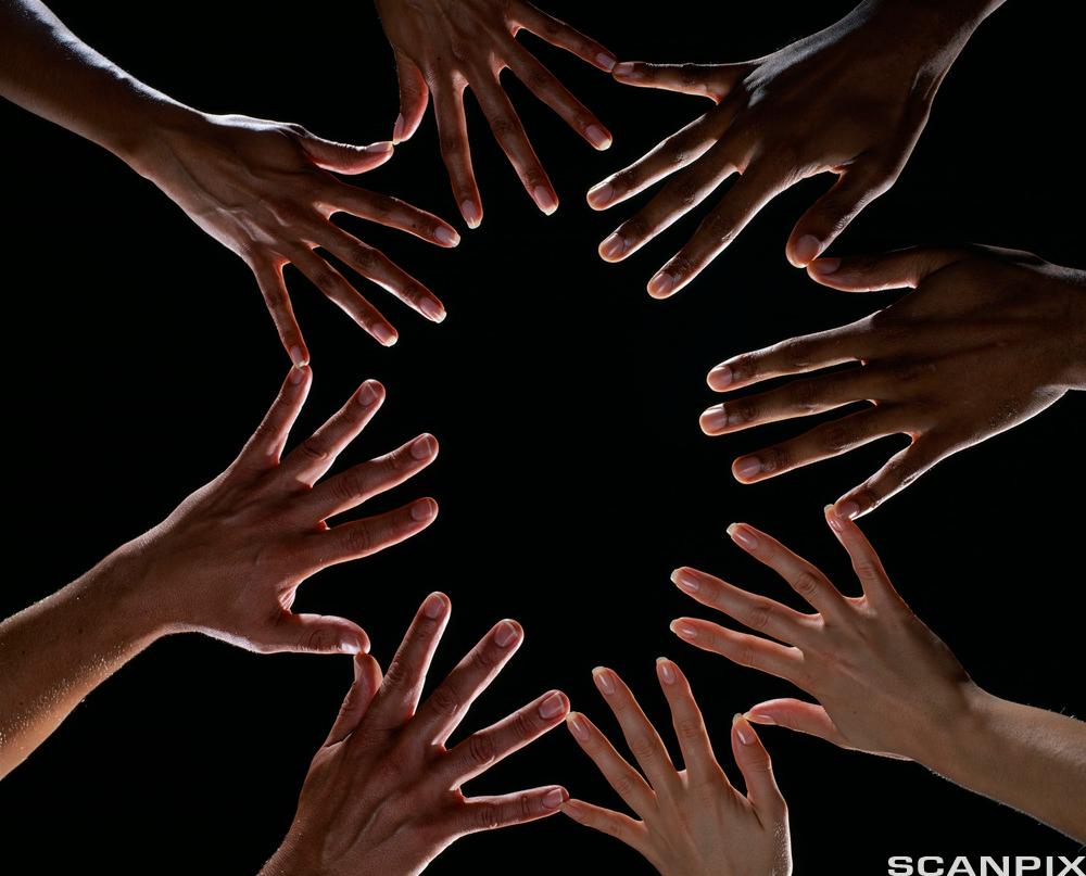 Four pair of splayed hands with different skin complexion