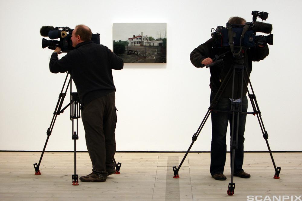 Camera crew film the piece called 'The Age of Bullshit 2010' by George Shaw