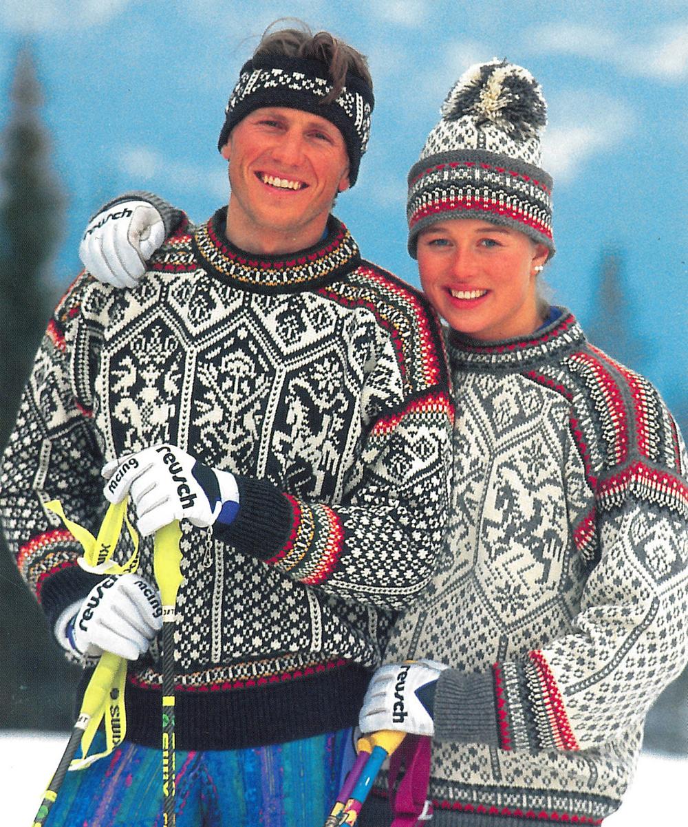 Mann og dame som har på seg Lillehammer-genseren. Foto.