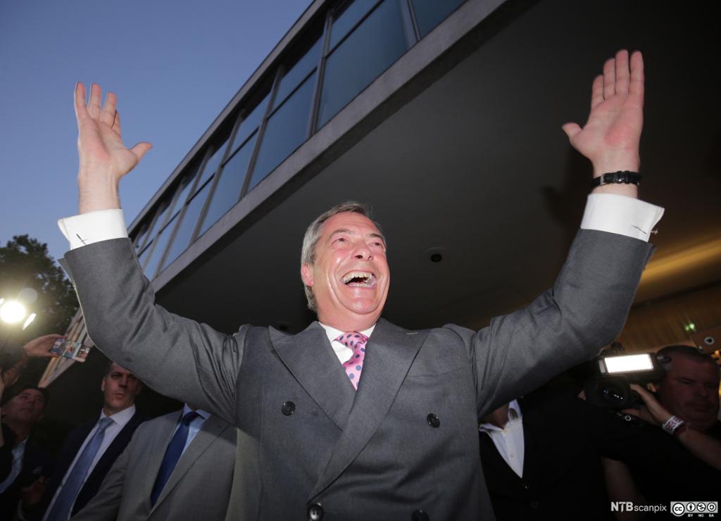 Nigel Farage, chairman of the UK Independence Party (UKIP), smiles as he leaves a Leave.EU referendum party in London, Britain, 24 June 2016.