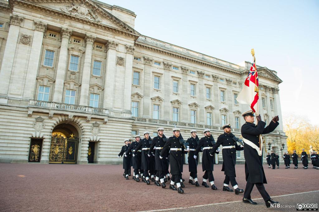 Sailors from the Royal Navy perform the Changing of the Guard ceremony at Buckingham Palace, London