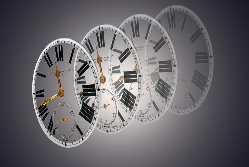 Clock faces gradually becoming more transparent. 