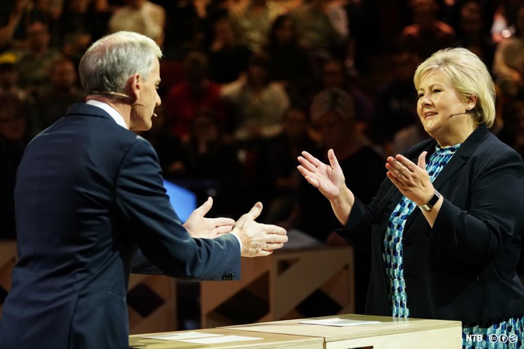 Jonas Gahr Støre og Erna Solberg i debatt. Foto.